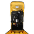 The Condor Nomad Backpack 25L in yellow showcases organized compartments holding EDC essentials—electronics, cables, multitool, flashlight, and gear—for first responders or range trips.