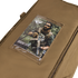 A tan Condor Haul 37 Rolling Duffle with a clear pocket holds a 2024 Condor catalog showing a man in military gear holding a rifle.