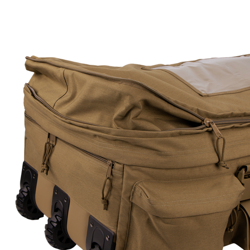 The Condor Haul 37 Rolling Duffle is a tan fabric tactical bag with multiple zippered pockets and black wheels on one side, shown partially unzipped at the top.