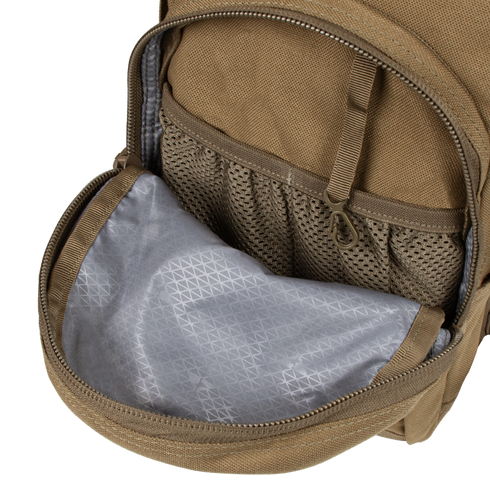 The Condor Hydration Backpack 8L in tan features a mesh pocket and gray geometric-pattern inner lining in the front compartment—perfect for first responders or law enforcement.