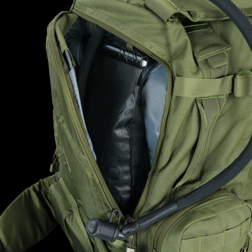 The Condor 3-Day Assault Backpack 50L in Scorpion OCP is shown open, revealing a hydration bladder and drinking hose inside—perfect for first responders or military use.