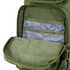 The Condor Compact Assault Backpack 24L in olive green features a tactical design with a zippered main compartment and interior pockets lined with translucent material for easy organization.