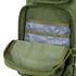 The Condor Compact Assault Backpack 24L in olive green features a tactical design with a zippered main compartment and interior pockets lined with translucent material for easy organization.