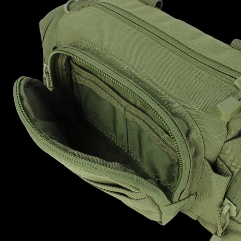 A close-up of the Condor Deployment Bag 6.5L in Scorpion OCP shows its open, empty main compartment and zippered pocket—ideal for EDC or shooting range essentials.