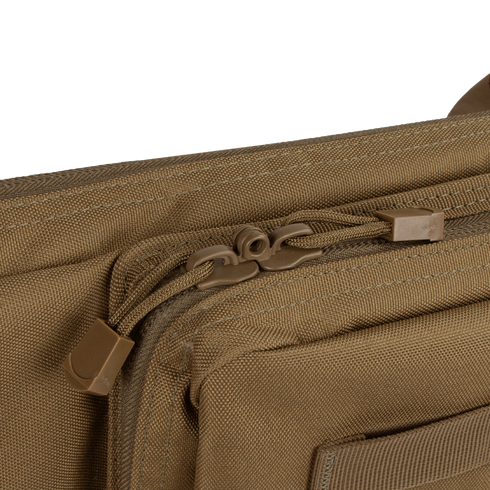 Close-up of the Condor 42 Single Rifle Case in brown, featuring two zippers with tan pull cords and detailed stitching.