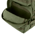 A close-up of an open front pocket on the Condor Medium Assault Backpack 30L in olive green, showing its interior compartment.