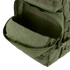 A close-up of an open front pocket on the Condor Medium Assault Backpack 30L in olive green, showing its interior compartment.