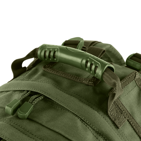 Close-up of the Condor Medium Assault Backpack 30L in green, highlighting its sturdy plastic handle, durable zipper pulls, and reinforced fabric stitching.