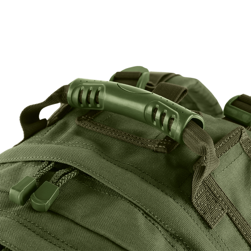 Close-up of the Condor Medium Assault Backpack 30L in green, highlighting its sturdy plastic handle, durable zipper pulls, and reinforced fabric stitching.