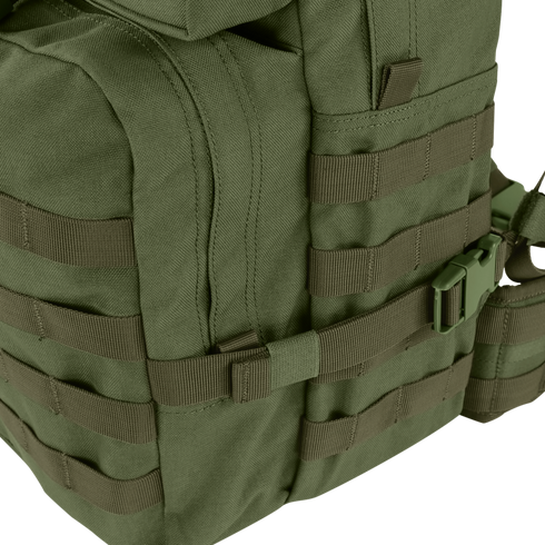 Close-up of the Condor Medium Assault Backpack 30L in green, featuring multiple webbing straps, zippers, and a plastic buckle—ideal for outdoor or military use.