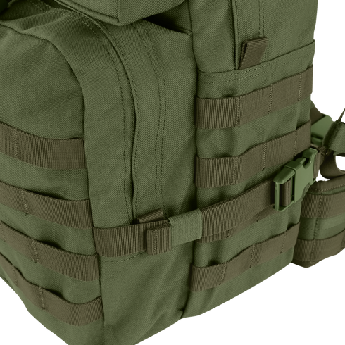 Close-up of the Condor Medium Assault Backpack 30L in green, featuring multiple webbing straps, zippers, and a plastic buckle—ideal for outdoor or military use.