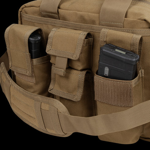 A close-up of the Condor Tactical Response Bag 8L in tan, featuring three external pouches each holding a black magazine—perfect gear for first responders and law enforcement.