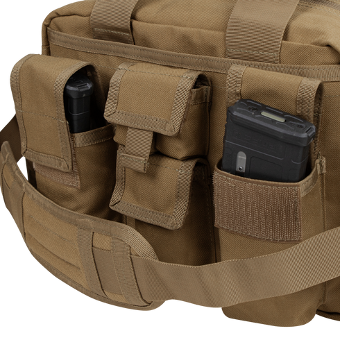 A close-up of the Condor Tactical Response Bag 8L in tan, featuring three external pouches each holding a black magazine—perfect gear for first responders and law enforcement.