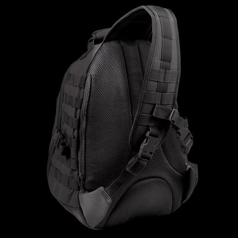 The Condor Ambidextrous Sling 27L is a black tactical backpack with a padded mesh back, adjustable strap, buckles, and webbing loops, designed for law enforcement or military use and shown from the rear.