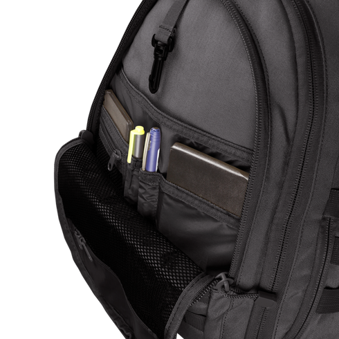 The Condor Ambidextrous Sling 27L, shown in gray with its front pocket open and organized compartments holding two notebooks, a yellow highlighter, a purple pen, and a black pen—perfect for first responder essentials.