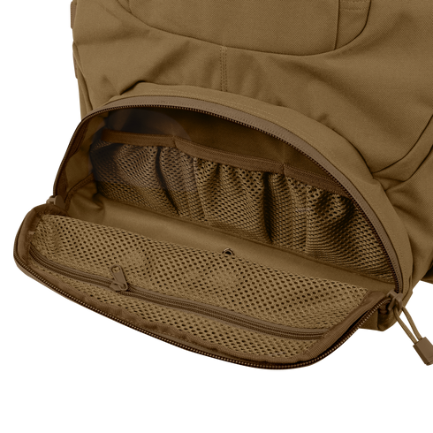 A close-up of the Condor Urban Go Backpack 33L showcases its open brown pocket with mesh organizer compartments and a zippered mesh pouch inside.