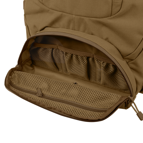 A close-up of the Condor Urban Go Backpack 33L showcases its open brown pocket with mesh organizer compartments and a zippered mesh pouch inside.