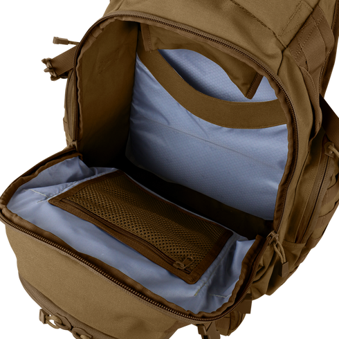 The Condor Urban Go Backpack 33L is shown open, revealing a spacious main compartment with light blue lining and a mesh zippered pocket inside.