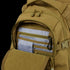 The Condor Urban Go Backpack 33L in Scorpion OCP is shown with its front pocket open, displaying an EDC organizer panel with zippers, a blue pouch, and a black carabiner clip.