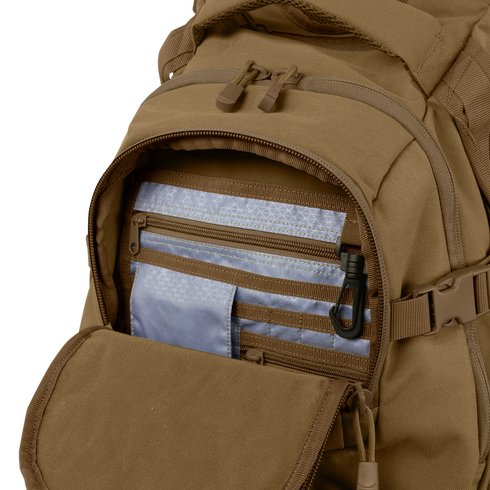 The Condor Urban Go Backpack 33L in brown is shown with its front pocket unzipped, revealing multiple blue and gray organizer compartments and a black key clip inside.
