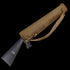The Condor Shotgun Scabbard is a brown tactical carrying case with a shoulder strap, designed to hold and protect your firearm stock and grip, which are partially visible at one end.