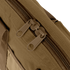 Close-up of two brown tactical zipper pulls on the Condor Pistol Case, highlighting the fabric bags zipper teeth and stitching details.