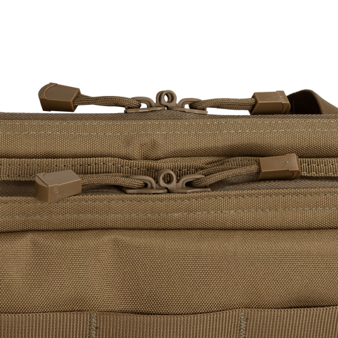 Close-up of two brown zippers with cord pulls on the Condor 42 Double Rifle Case in tan, highlighting stitching and texture—ideal for EDC gear or first responder essentials.