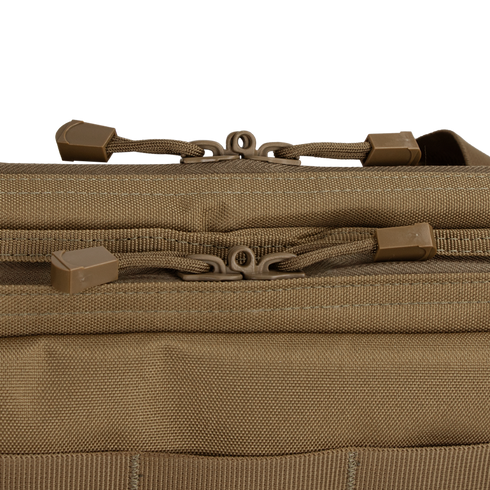 Close-up of two brown zippers with cord pulls on the Condor 42 Double Rifle Case in tan, highlighting stitching and texture—ideal for EDC gear or first responder essentials.