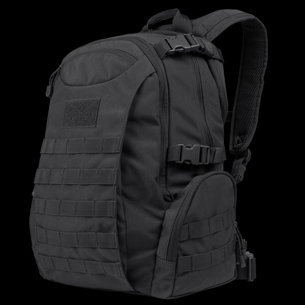 The Condor Commuter Backpack 26L is a black tactical pack featuring multiple compartments, MOLLE webbing, adjustable straps, and a top handle—perfect for bushcraft or trips to the shooting range.