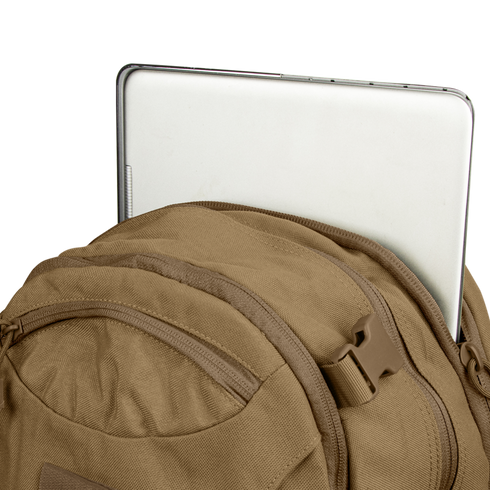 A silver laptop partially sticks out of the main compartment of the Condor Commuter Backpack 26L in tan, set against a plain background.
