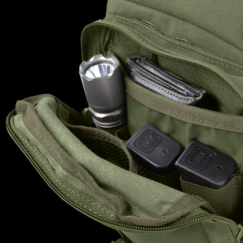 The Condor EDC Bag is shown open, displaying a flashlight, black wallet, and three ammo magazines neatly organized in separate compartments.