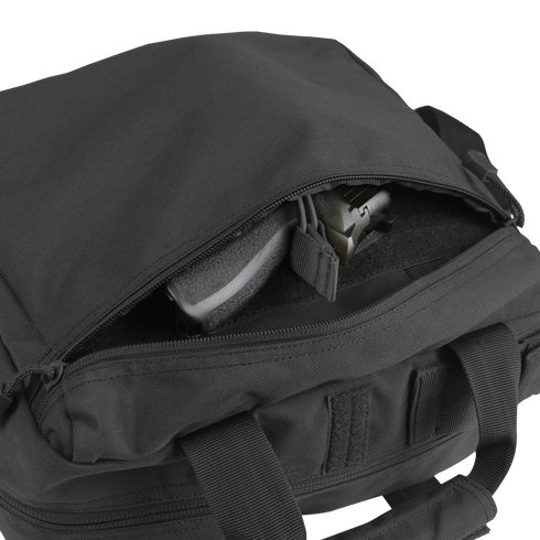 The Condor E & E Bag 9L in black, shown with a partially open zipper exposing a handgun inside, is designed for everyday carry (EDC) or law enforcement applications.
