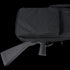 A Condor 38 Rifle Case, in black, reveals part of a rifle’s stock and grip protruding from its zippered opening.