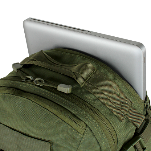 A silver laptop partially inserted into the back compartment of the Condor Venture Backpack 27.5L in Scorpion OCP, perfect for military or law enforcement professionals heading to the shooting range.