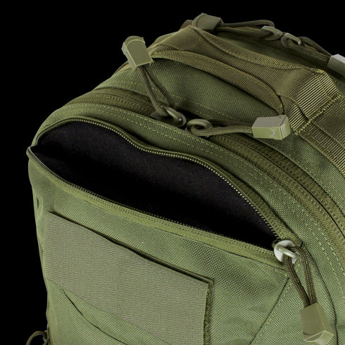 A close-up of the Condor Venture Backpack 27.5L in Scorpion OCP, showing a partially open zipper that reveals the black lining and multiple compartments, popular for military and law enforcement use.