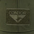 Close-up of an olive green Condor Flex Tactical Cap featuring a fabric patch with the CONDOR name and stylized bird logo.