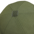 Close-up of the top of the Condor Flex Tactical Cap in olive green, highlighting its stitching, panels, and fabric-covered center button—ideal for everyday carry or a day at the shooting range.