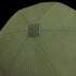 Close-up of the top of the Condor Flex Tactical Cap - MultiCam, highlighting stitching details and a fabric-covered center button, commonly worn by law enforcement or first responders.