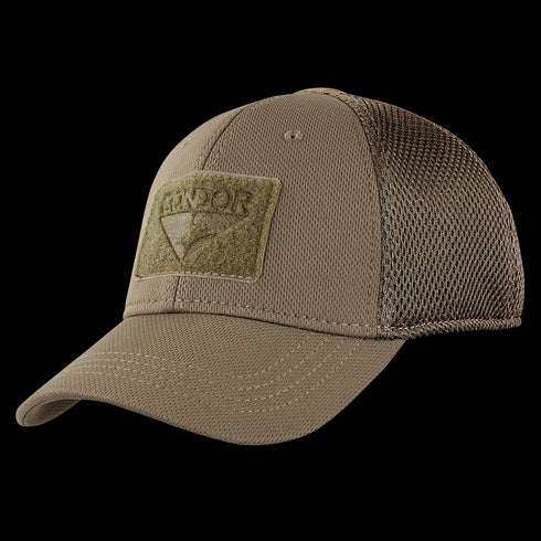 The Condor Flex Tactical Mesh Cap is a tan trucker hat with a curved brim and front Velcro patch, ideal for EDC or range days. Shown here at an angle.