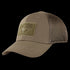 The Condor Flex Tactical Mesh Cap is a tan trucker hat with a curved brim and front Velcro patch, ideal for EDC or range days. Shown here at an angle.
