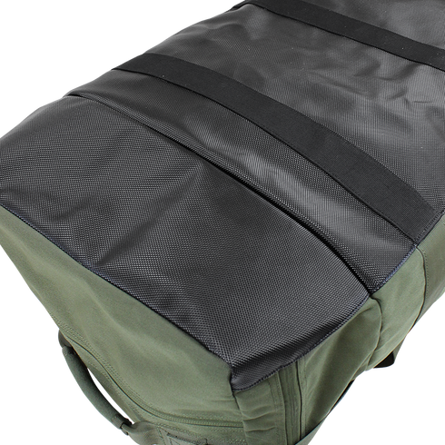 Close-up view of the Condor Centurion Duffle Bag 46L, featuring a tactical green body, textured black top panel, and horizontal webbing strips—ideal for law enforcement or first responders.