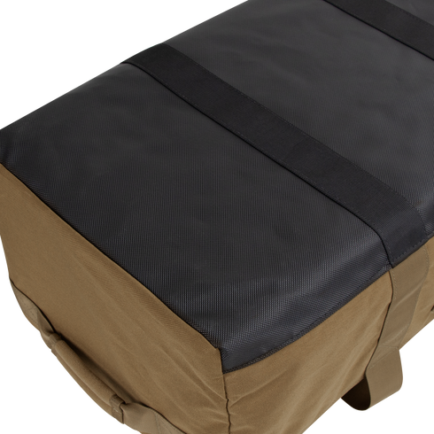 A close-up view of the Condor Colossus Duffle Bag 60L, featuring a rectangular shape, black top, brown sides, and two black straps running across the top.