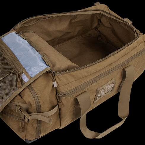 The Condor Colossus Duffle Bag 60L, shown in tan with its main compartment open, reveals a roomy interior and inner mesh pocket—perfect for organizing first responder or military gear.