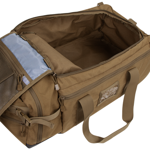 The Condor Colossus Duffle Bag 60L, shown in tan with its main compartment open, reveals a roomy interior and inner mesh pocket—perfect for organizing first responder or military gear.
