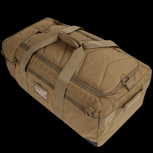 The Condor Colossus Duffle Bag 60L in tan is shown on a white background, featuring multiple zippered compartments, carrying handles, and shoulder straps.