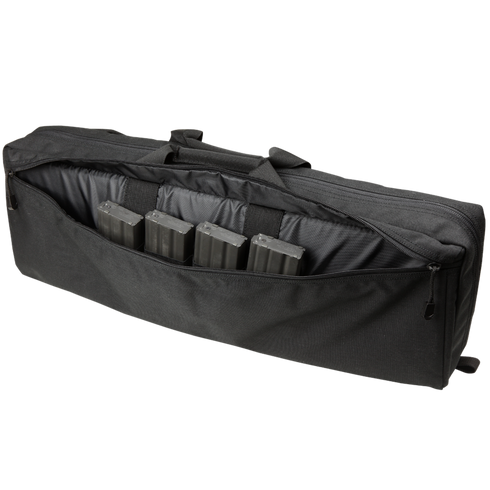 The Condor 25" Transporter Case is a black soft case with a zippered opening, featuring four rectangular objects stored inside its front pocket.