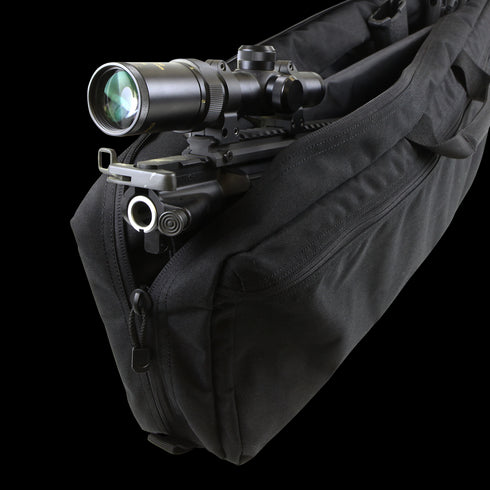 A Condor 25 Transporter Case with a rifle and mounted scope inside, perfect for bushcraft or EDC outings, is shown partially open with its black padded design.