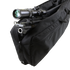 A Condor 25 Transporter Case with a rifle and mounted scope inside, perfect for bushcraft or EDC outings, is shown partially open with its black padded design.