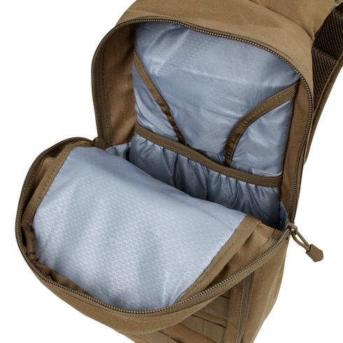 The Condor Fuel Hydration Backpack 18L in tan features a light blue interior with multiple pockets and compartments for organized gear storage.