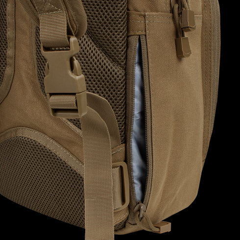 Close-up of the Condor Fuel Hydration Backpack 18L in brown, featuring a side zipper pocket for gear, mesh padding, and an adjustable strap with plastic buckle for comfort.